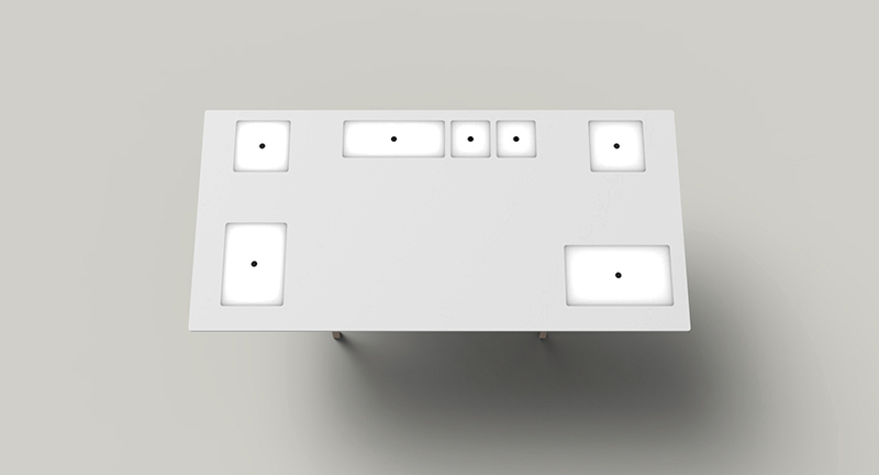 Illustration for article titled A Co-Working Table With Hidden Depths